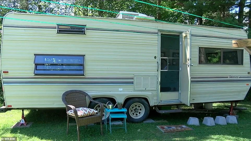 Outdoor space: Lauren has a wicker chair and small table outside for when she wants fresh air. She named the RV 