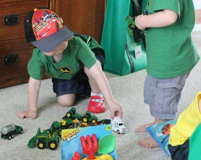 two year old playing on the floor as part of his daily routine