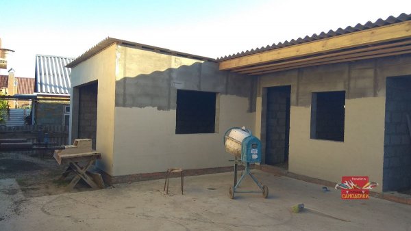 Грунтовка и покраска стен мастерской, гаража и бани
